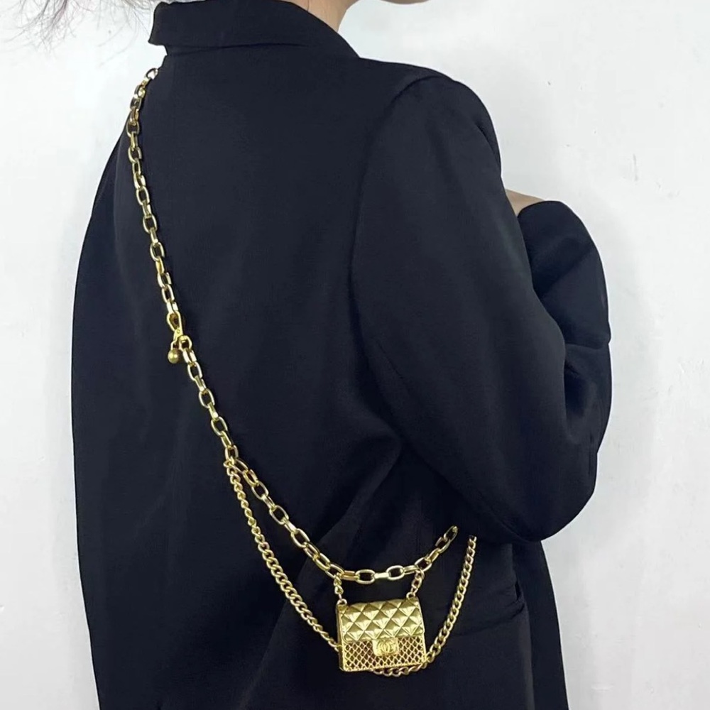 Anthropologie Fashion Tassel Gold Chain Belt with mini Bag Trendy!

Mini Bag